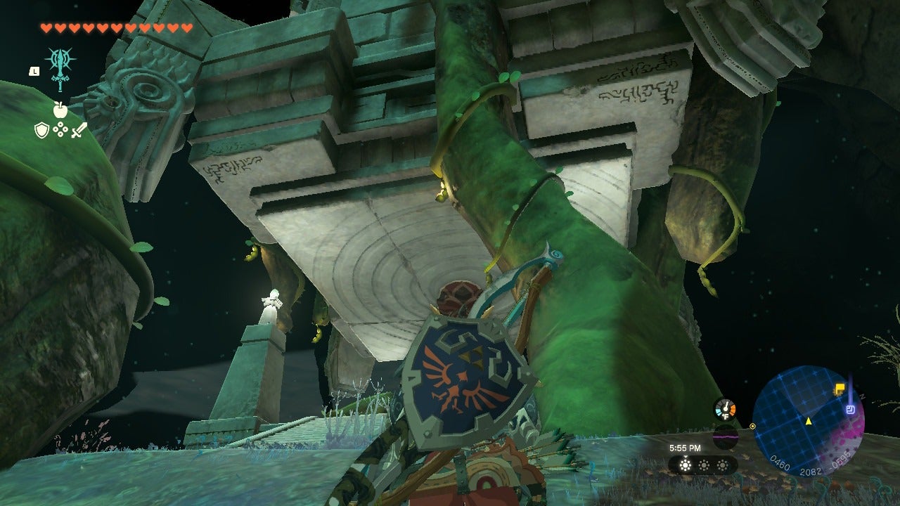 Link is seen approaching the low ceiling in the depths.