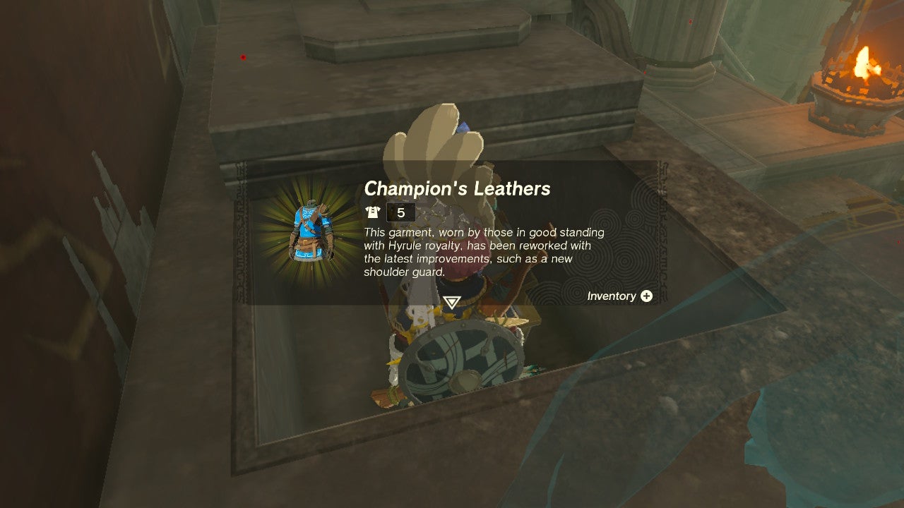 A sobreposição de skins do herói acima do link aparece na frente de um baú contendo o item de roupa.
