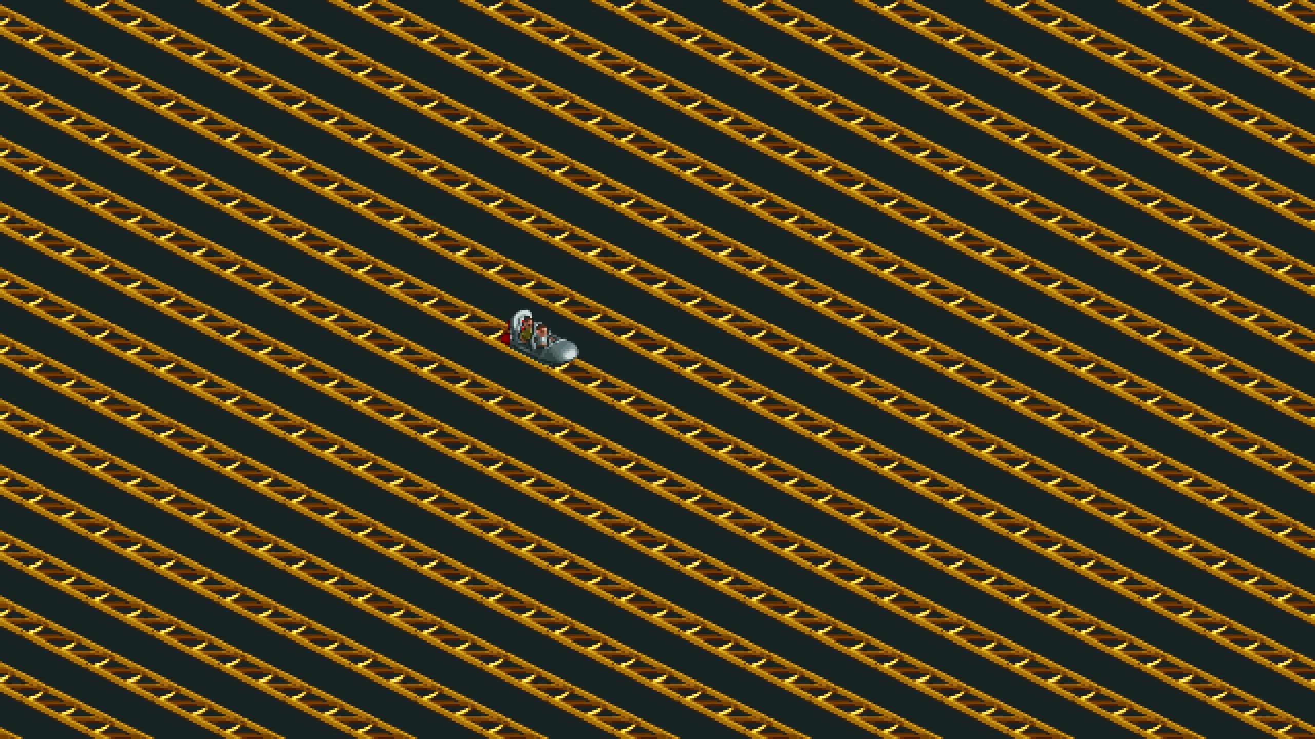 Uma captura de tela mostra um único carro de montanha-russa preso em um enorme labirinto de trilhos.