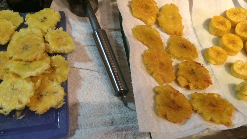 A Puerto Rican Feast Pernil Tostones Cuban Beans Arroz Con Gandules