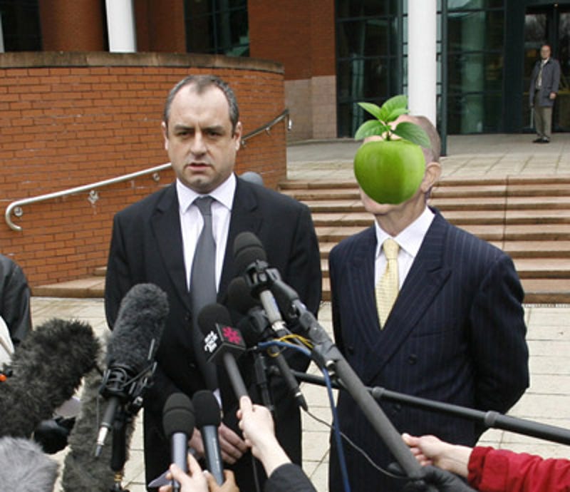Man With Apple Hovering In Front Of Face Sues Rene Magritte S Estate