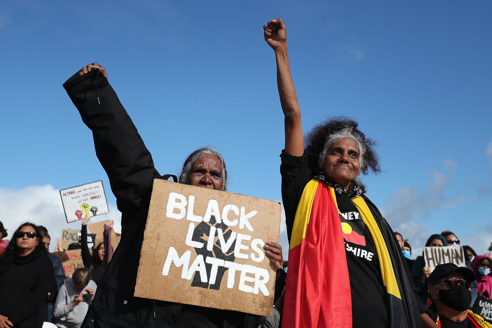 Protesters show their support during the Black Lives Matter Rally at Langley Park on June 13, 2020 in Perth, Australia.