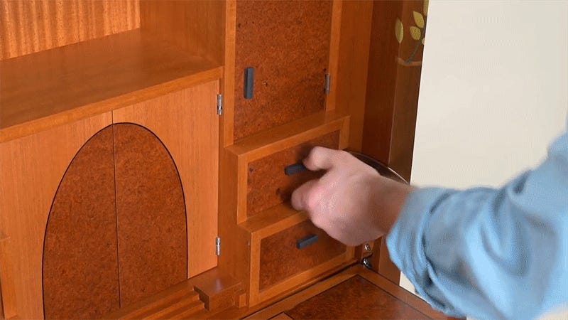This Beautiful Wooden Cabinet Hides The Most Fiendishly