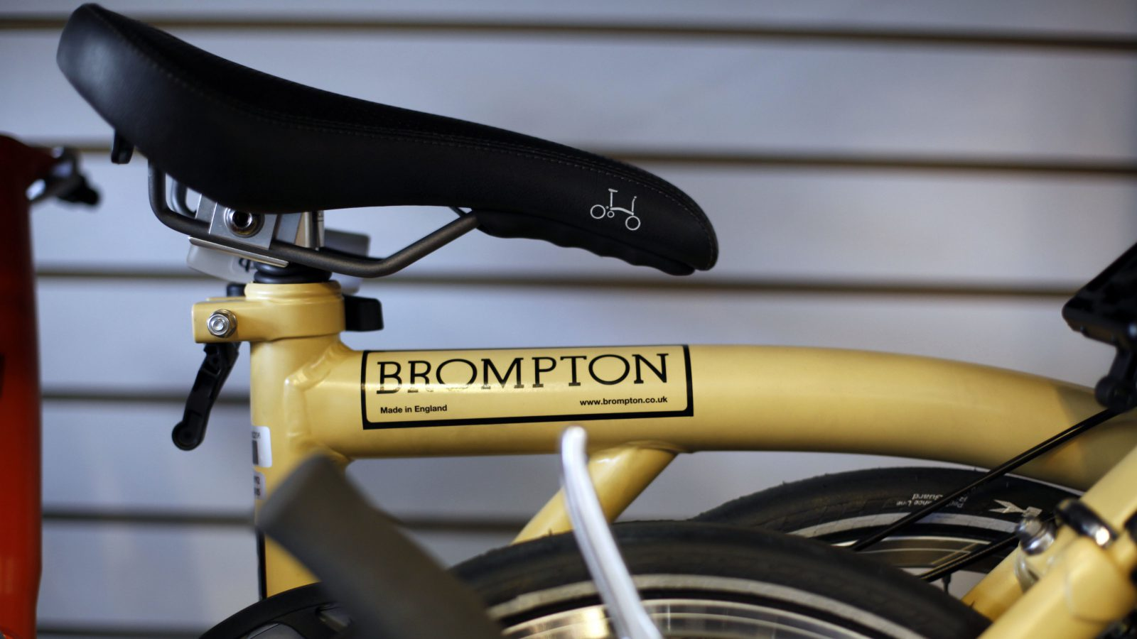 yellow brompton bike