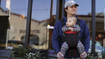 Steve Caniglia holds his six-month-old son, Boden, in San Francisco, California February 19, 2014. After tumbling more than 8 percent on the way to record lows after the 2008 financial crisis, the U.S. birth rate is expected to increase over the next two years for the first time since 2007 as young people gain more confidence to start families because of the stronger economy, demographers say. Picture taken February 19, 2014. REUTERS/Robert Galbraith