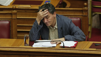 Greek Finance Minister Euclid Tsakalotos reacts as he attends a parliamentary session in Athens, Greece July 15, 2015.
