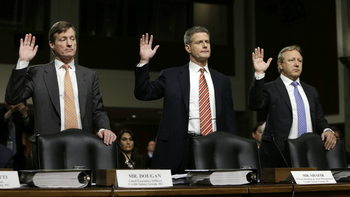 (L-R) Credit Suisse officials CEO Brady Dougan, Robert Shafir and Hans Urlich-Mesiter are sworn in before the Senate Homeland and Governmental Affairs Investigations Subcommittee on Capitol Hill in Washington February 26, 2014.