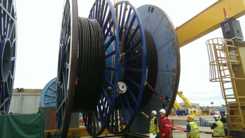 Large undersea cable reels.
