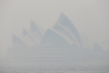Thick smoke from wildfires shroud the Opera House in Sydney, Australia, Tuesday, Dec. 10, 2019. Hot dry conditions have brought an early start to the fire season.