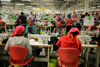 Workers sew clothes inside the Indochine Apparel PLC textile factory in Hawassa Industrial Park in Southern Nations, Nationalities and Peoples region, Ethiopia November 17, 2017. Picture taken November 17, 2017.REUTERS/Tiksa Negeri - RC17B0E7FE80