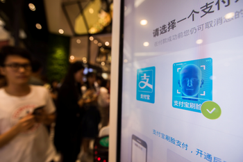 Alipay&#039;s facial recognition payment solution &quot;Smile to Pay&quot; is seen at KFC&#039;s new KPRO restaurant in Hangzhou, Zhejiang province, China September 1, 2017. REUTERS/Stringer ATTENTION EDITORS - THIS IMAGE WAS PROVIDED BY A THIRD PARTY. CHINA OUT. NO COMMERCIAL OR EDITORIAL SALES IN CHINA. - RC13F17F7AA0