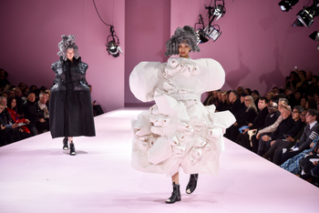 Models wear creations for Comme des Garcons Fall-Winter 2017/2018 ready to wear fashion collection presented Saturday, March 4, 2017 in Paris. (AP Photo/Zacharie Scheurer)