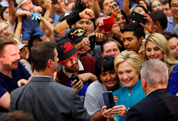 U.S. Democratic presidential candidate Hillary Clinton takes a picture with supporters during a campaign stop in Fresno, California, United States June 4, 2016.