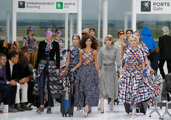 Models wear creations for Chanel&#039;s Spring-Summer 2016 ready-to-wear fashion collection presented during the Paris Fashion Week, Tuesday, Oct. 6, 2015 in Paris, France. (AP Photo/Francois Mori)