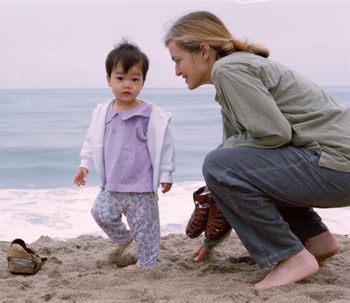 Jenny Bowen with Maya in 1997on a beach