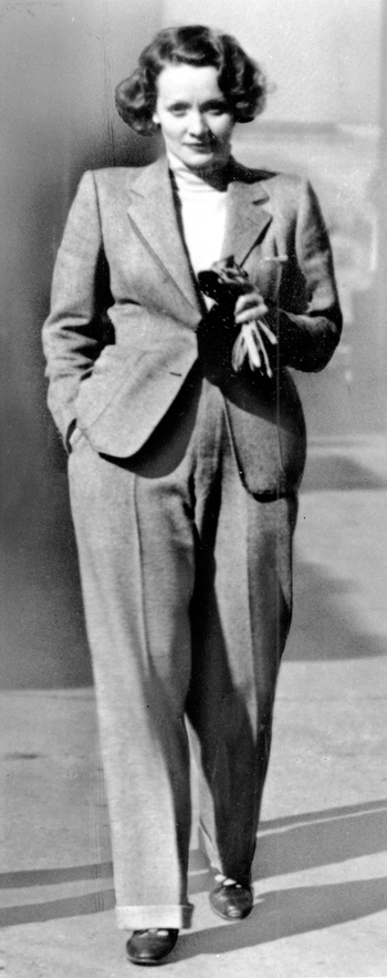 Actress Marlene Dietrich wears a trendsetting masculine style pant suit created by French couturiere Coco Chanel in 1933 at an unknown location. (AP Photo)