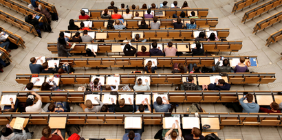 Students attend a lecture in the auditorium of Technical University of Munich.