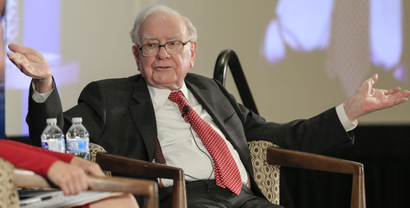 Investor Warren Buffett gestures on stage during a conversation with CNBC's Becky Quick, at a national conference sponsored by the Purpose Built Communities group that Buffett supports, in Omaha, Neb., Tuesday, Oct. 3, 2017, Buffett discussed what philanthropy can do to help fight poverty. (AP Photo/Nati Harnik)