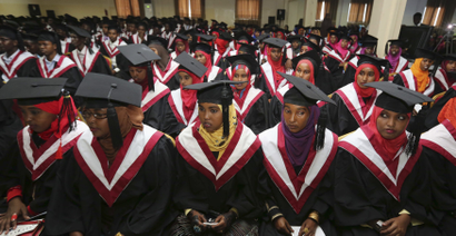A section of 740 graduating students from Simad University, look on during their graduation ceremony, in the capital Mogadishu, November 28, 2013. The number of graduates today is the highest since the collapse of the Somalia military regime in 1991, according to school officials.