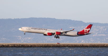 A Virgin Atlantic Airbus A340-600, with Tail Number G-VWKD, lands at San Francisco International Airport, San Francisco