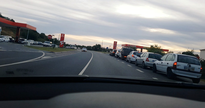 Cars and trucks line up for fuel in Albufeira, Portugal April 16, 2019 in this still image taken from social media video.