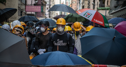 Hong Kong protesters in their trademark hard hats