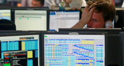 A trader from BGC, a global brokerage in London, reacts to the opening of European markets.