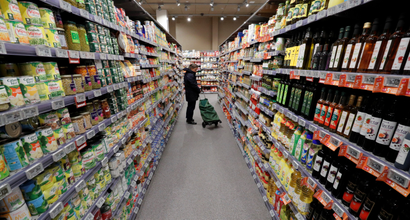 A customer search in an aisle in a grocery store in Paris, France, April 11, 2016.