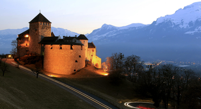 Cars drive past Vaduz Castle in Liechtenstein's capital Vaduz in this March 14, 2012 file photo.