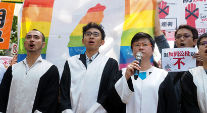 Taiwan gay rights groups protest referendums aimed at same-sex marriage.