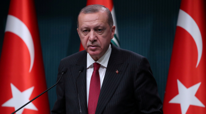 FILE PHOTO: Turkish President Tayyip Erdogan attends a news conference in Ankara, Turkey, August 14, 2018. REUTERS/Umit Bektas/File Photo - RC1188849680