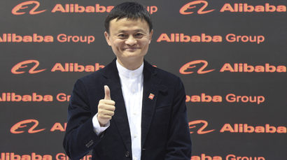 Alibaba founder and chairman Jack Ma poses for the media while touring the CeBIT trade fair in Hanover March 16, 2015. The world's biggest computer and software fair will open to the public from March 16 to 20. REUTERS/Fabian Bimmer