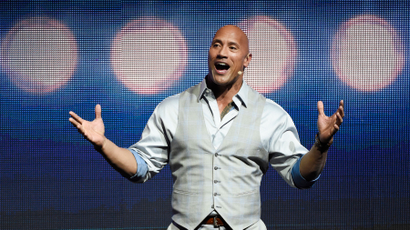 Dwayne Johnson, a cast member in the upcoming film "Baywatch," addresses the audience during the Paramount Pictures presentation at CinemaCon 2017 at Caesars Palace on Tuesday, March 28, 2017, in Las Vegas. (Photo by Chris Pizzello/Invision/AP)