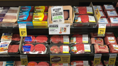 Beyond Meat's plant-based meat product in a grocery store meat aisle.