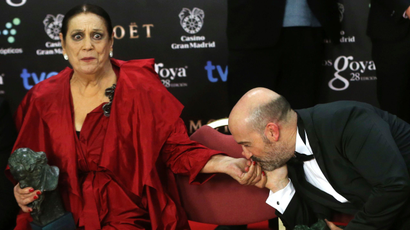 Actor Javier Camara, winner of the Best Leading Actor award, kisses the hand of actress Terele Pavez.