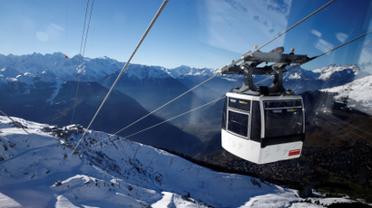 A ski lift over mountains.