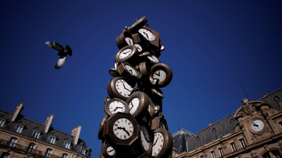 A view shows the clocks of the artwork "L'Heure de tous" (Everybody's Time) by French artist Arman (Armand Pierre Fernandez) in front of the Saint-Lazare railway station in Paris