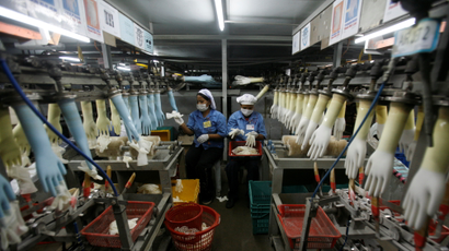 Blue and white gloves at a glove factory in Malaysia