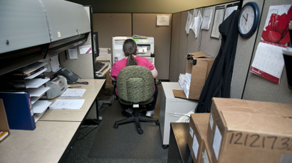 woman in cubicle