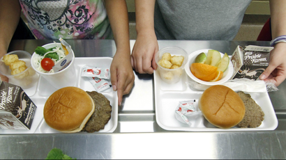School children are offered a nutritious menu that includes burgers and tater tots