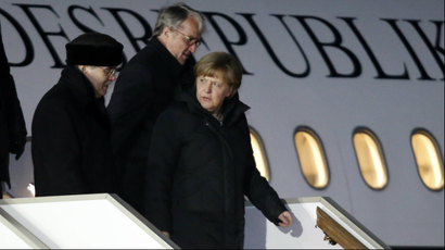 German Chancellor Angela Merkel disembarks from a plane upon her arrival at Moscow's Vnukovo airport February 6, 2015.