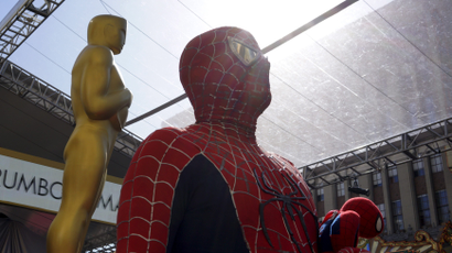 A man in a Spider-Man costume at the 88th Academy Awards in Los Angeles.