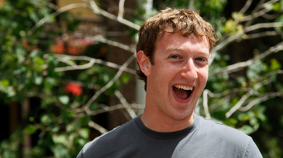 Mark Zuckerberg, Facebook CEO and founder laughs outside the Sun Valley Inn in Sun Valley, Idaho July 9, 2009. The resort is the site for the annual Allen &amp; Co's media and technology conference. REUTERS/Rick Wilking (UNITED STATES BUSINESS SCI TECH MEDIA) - RTR25I6M