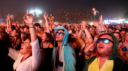 Festivalgoers attend the Sziget music festival on an island in the Danube River in Budapest