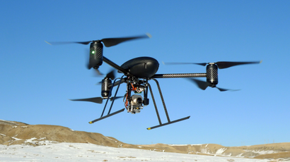 In this Jan. 8, 2009, photo provided by the Mesa County Sheriff's Department, a small Draganflyer X6 drone is photographed during a test flight in Mesa County, Colo., with a Forward Looking Infared payload.