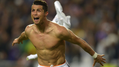 Real's Cristiano Ronaldo. takes off his shirt, at the end of the Champions League final soccer match between Atletico Madrid and Real Madrid, at the Luz stadium, in Lisbon, Portugal, Saturday, May 24, 2014. (AP Photo/Manu Fernandez