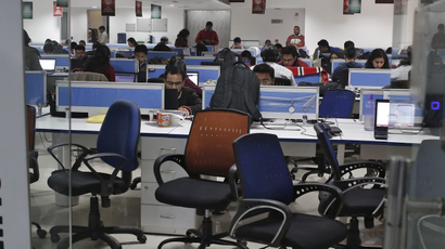 Employees of Shopclues.com work inside their office in Gurgaon