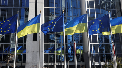 EU and Ukrainian flags outside the EU building