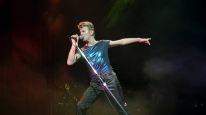 In this Sept. 14, 1995, file photo, David Bowie performs in Hartford, Conn.