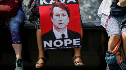 People take part in a protest against Supreme Court nominee Brett Kavanaugh